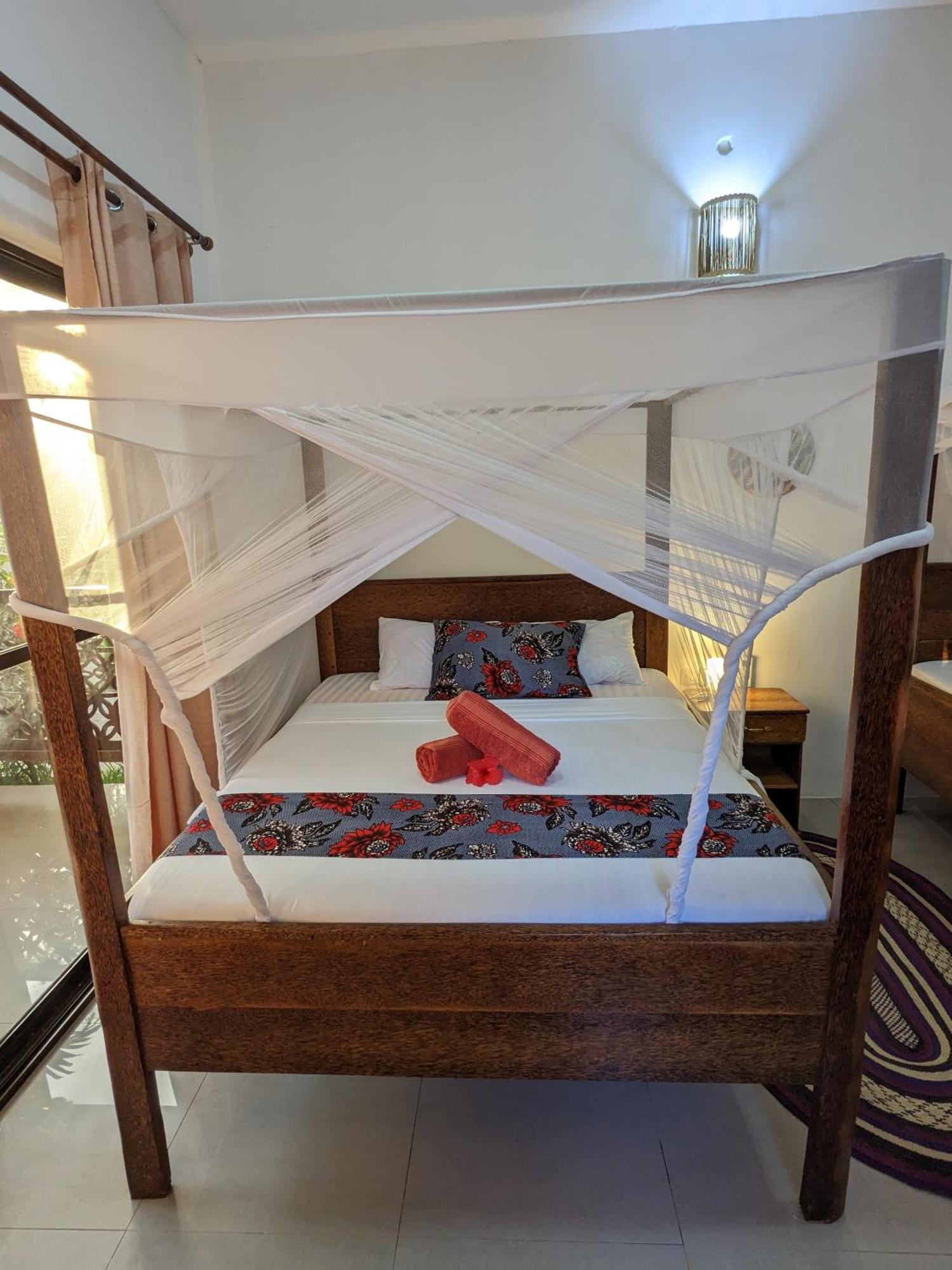 Mkadi Beach House Hotell Nungwi Rom bilde